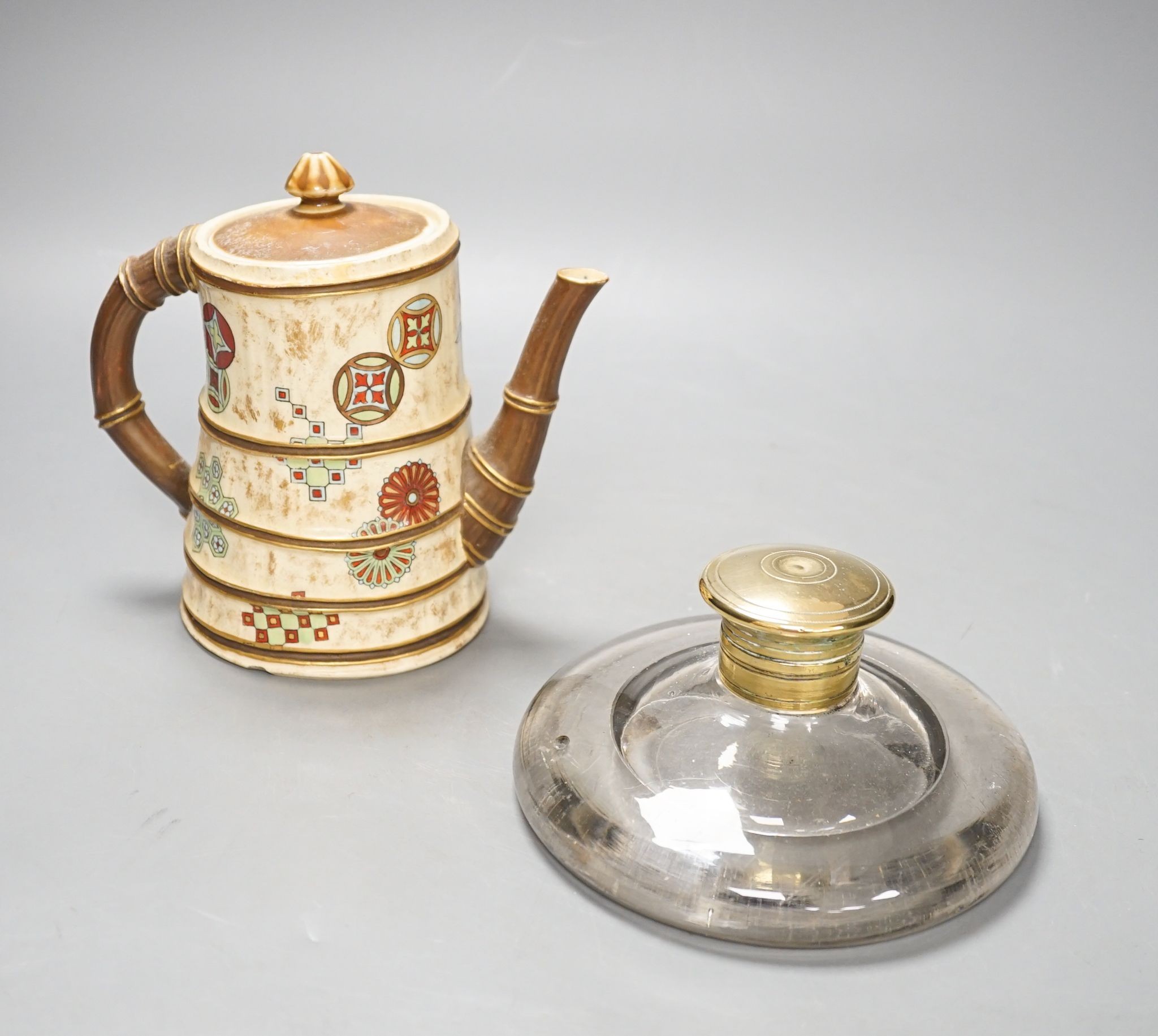 A Royal Worcester Japanese taste coffee pot and a Victorian glass squat shaped inkwell, with a brass lid (2)